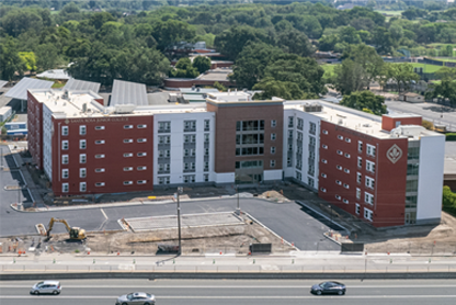 Exterior of the much anticipated new student housing building, Polly Hall! 
